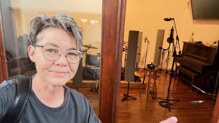 The home studio: drum kit, microphones, and piano